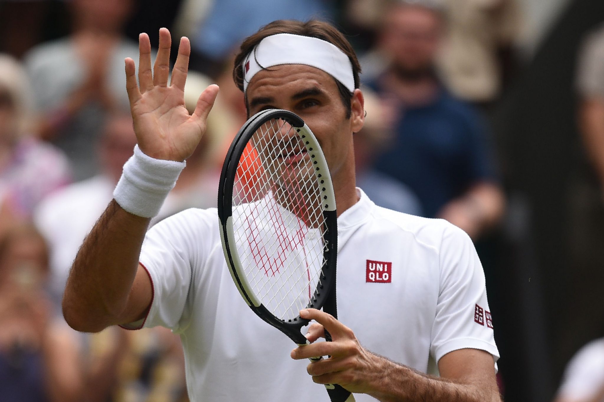 Roger Federer krijgt RF-logo terug van Nike en nu kan Uniqlo zich uitleven